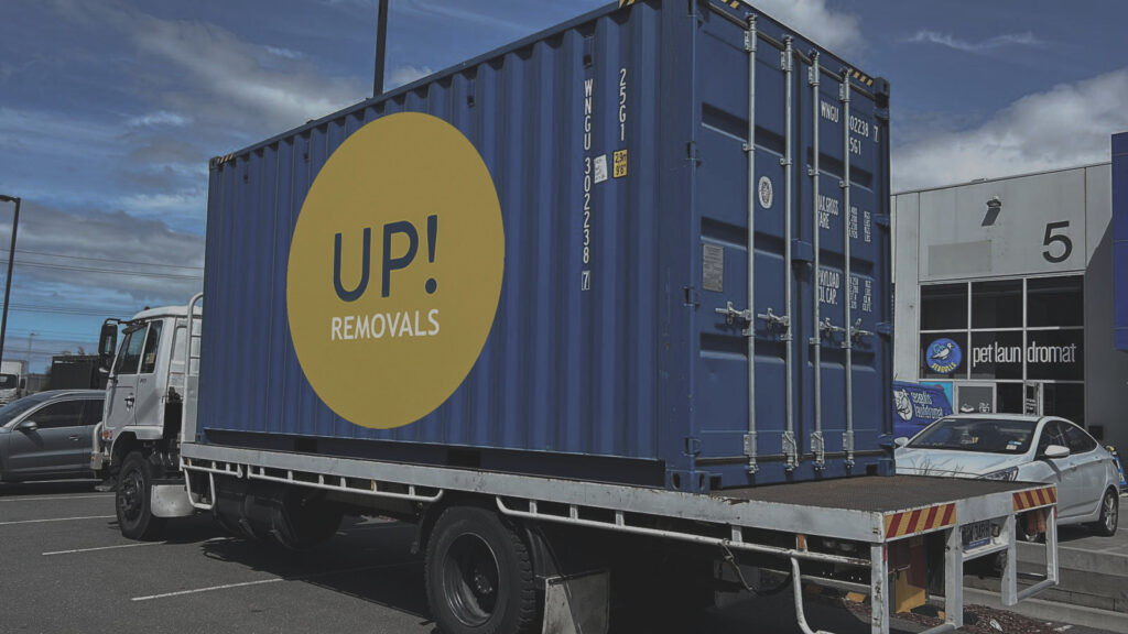 Removal truck transporting a storage container for interstate or long-distance moves in Australia